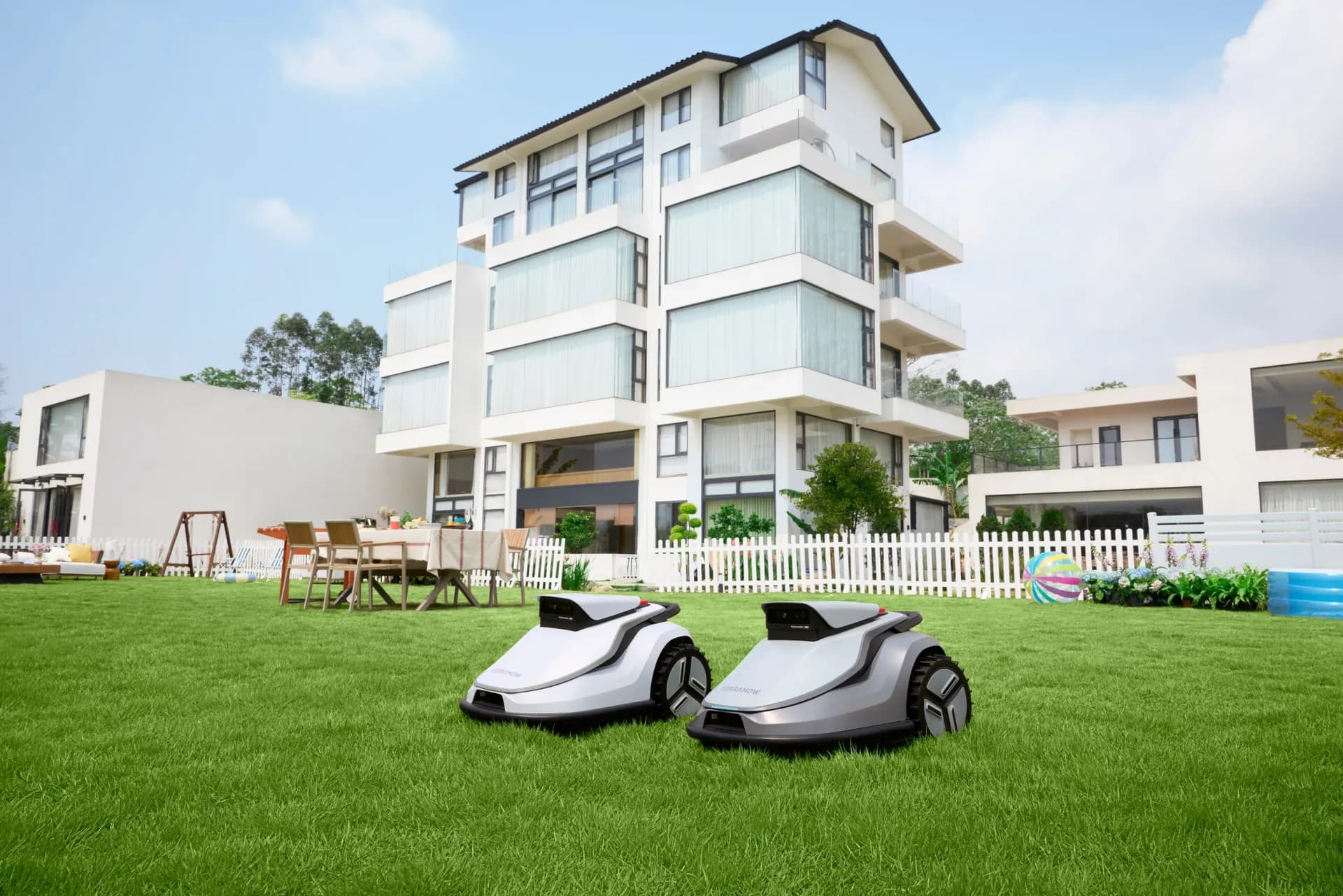 TERRAMOW robotic lawn mowers in a modern garden